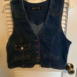 Nanette Lepore Denim Vest. Never worn . Good for dressing up with a graphic Tee.